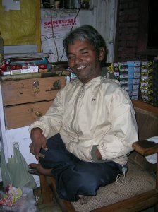 Sunil on his cushioned couch next to his stall